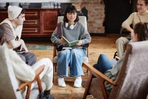 Woman reading a book for students
